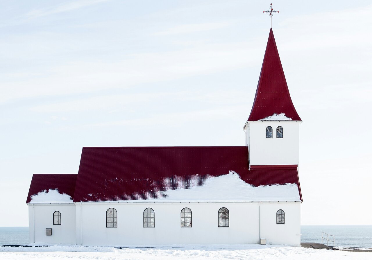 Quaint church building in the snow