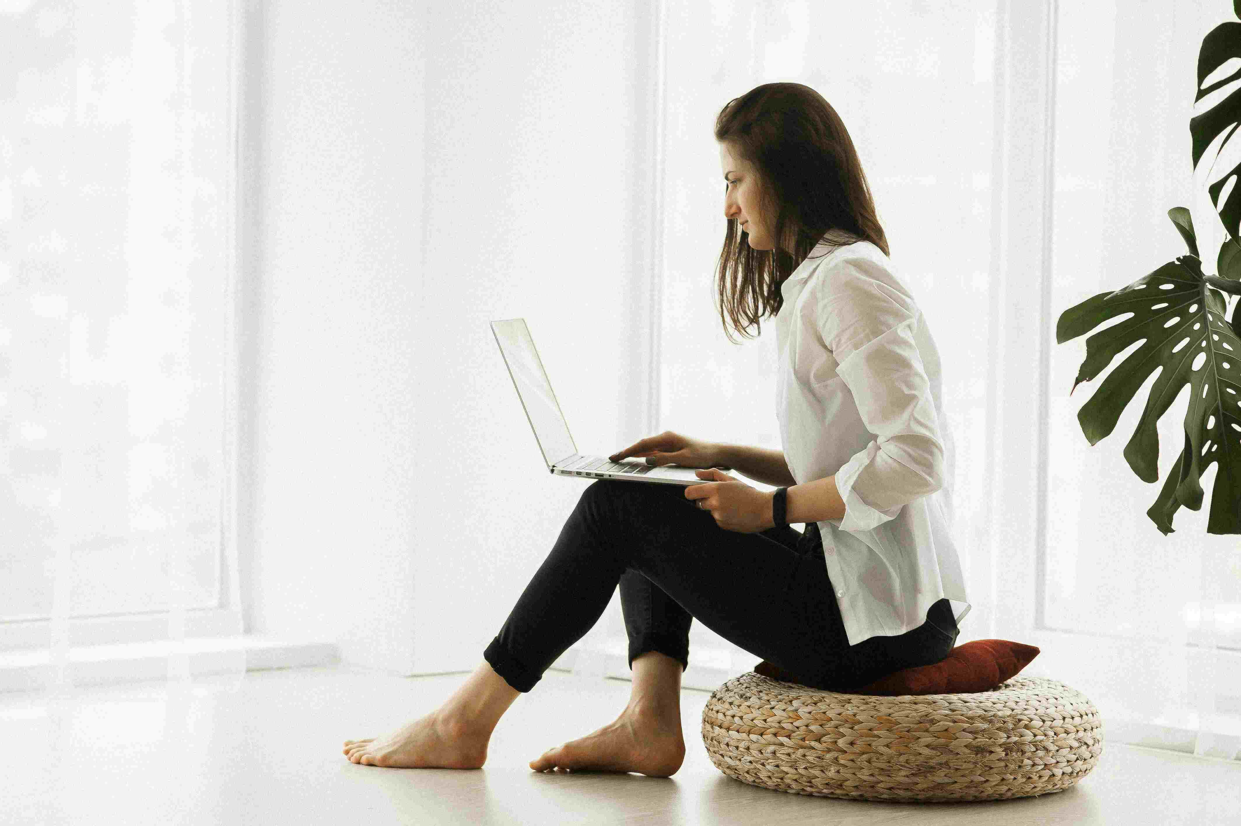 Woman holding laptop